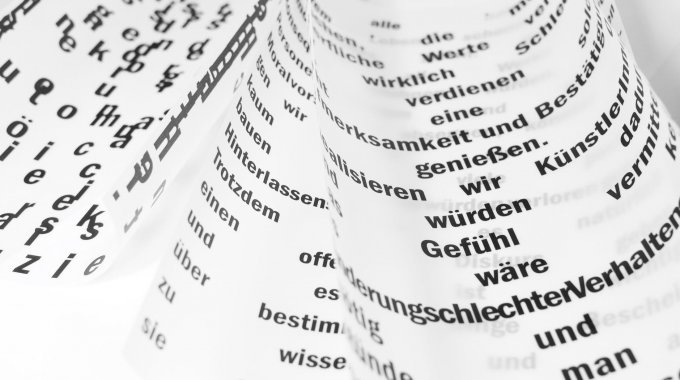 German Text On Pieces Of Paper