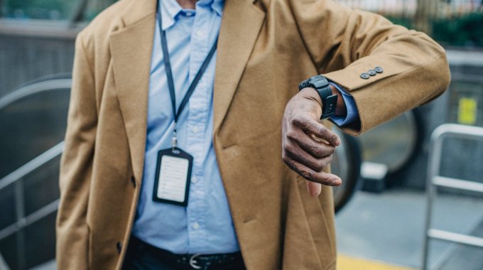 Crop Faceless Black Man Checking Time On Wristwatch On Street